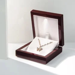 Caja de joyería colgante de anillo de boda de madera roja con luz LED, baratija pequeña, almacenamiento de joyas, estuche de exhibición