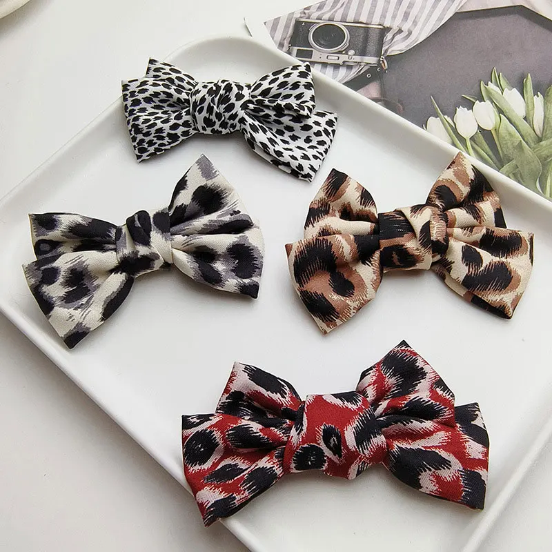 

100pcs - Autumn and winter leopard print bowknot appliques for DIY Clothes Hat Sewing Patches Headdress Hair Clips Decoration