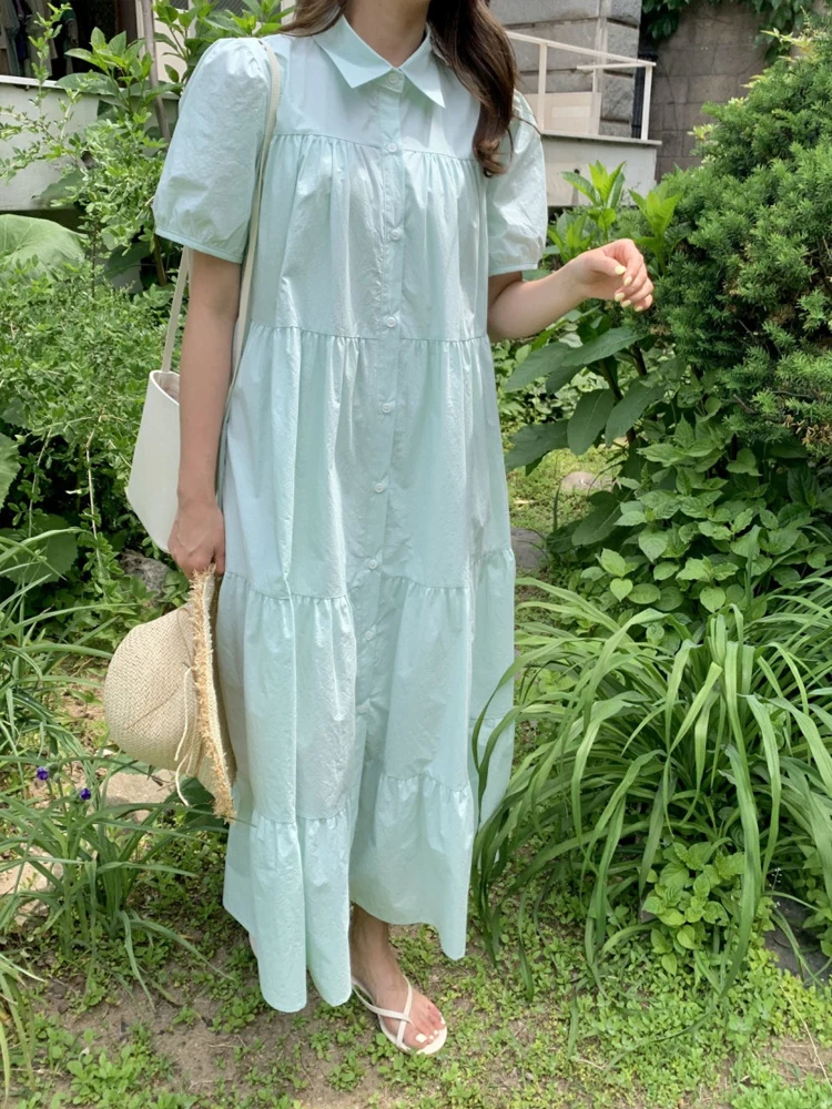 Vestido longo f de verão 2024, foado, com mangas bufantes, design com fendas, e, com botão único, saia em cam...