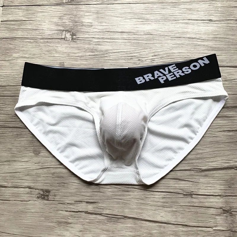 Bragas de tiro bajo para hombres jóvenes, bolsa grande Sexy, malla transpirable sedosa, calzoncillos convexos en U de secado rápido