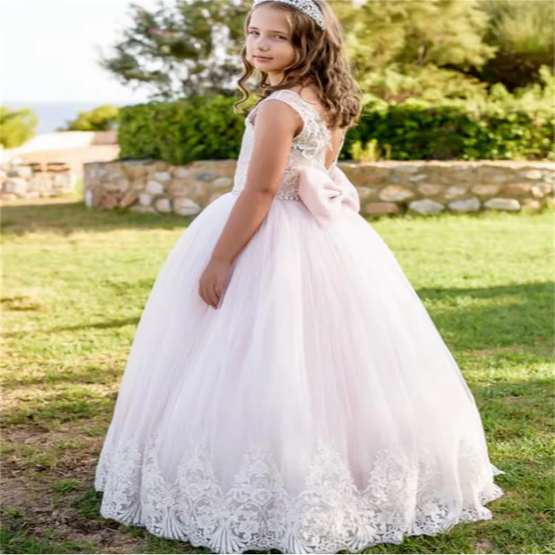 Abiti da ragazza di fiori con applicazioni in tulle rosa chiaro con fiocco senza maniche per abiti da principessa per banchetti, feste di compleanno, matrimoni