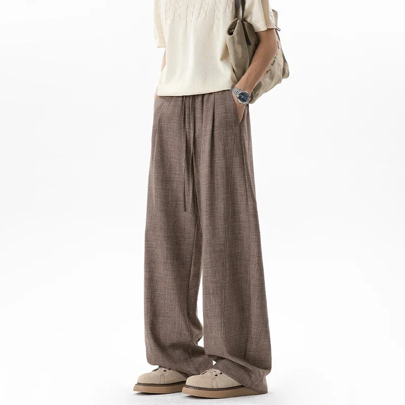 Atmungsaktive Herrenhose aus Kunstleinen mit gebogenem Bein, locker geschnittene, weit geschnittene Freizeithose für den täglichen Gebrauch.
