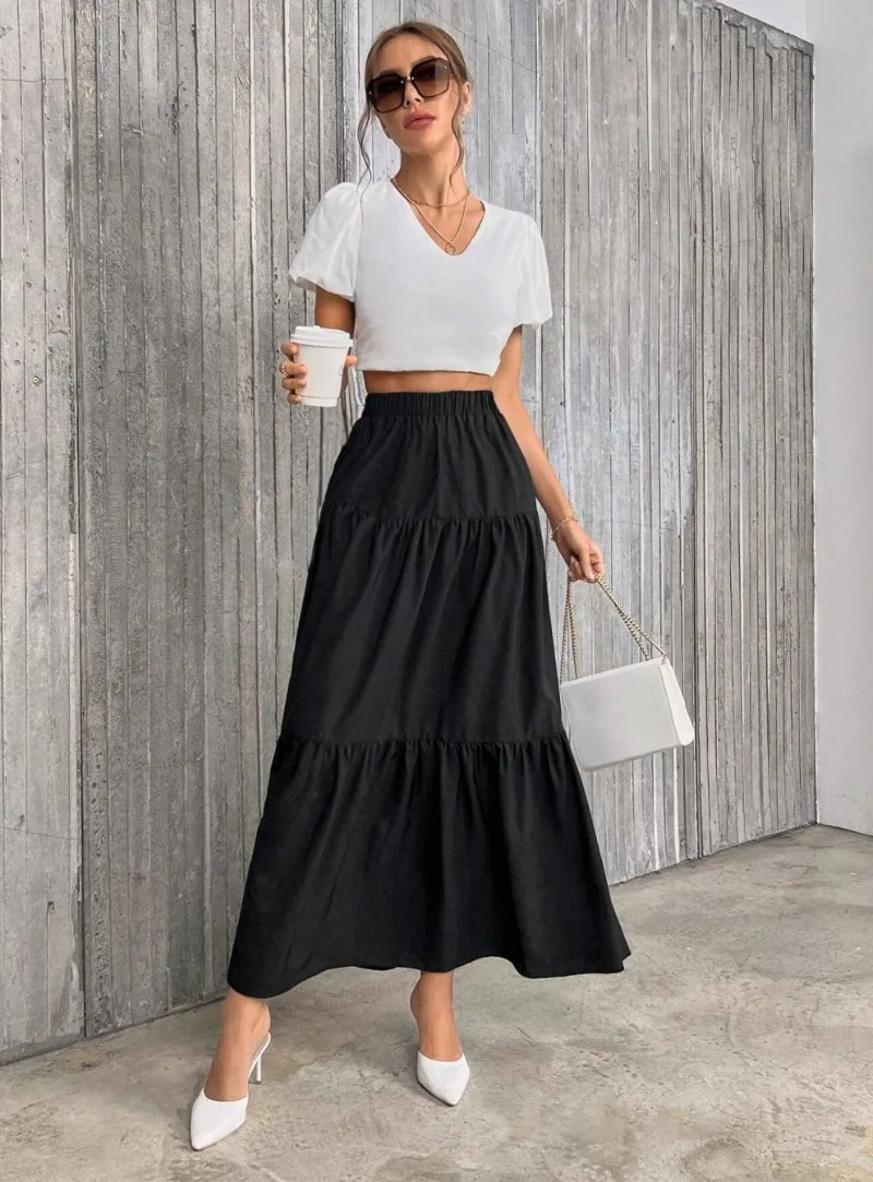 

Стильная черная юбка-миди для поездок на работу. Длинная многоярусная юбка с рюшами на эластичной талии. Свободная и повседневная юбка-миди для женщин.