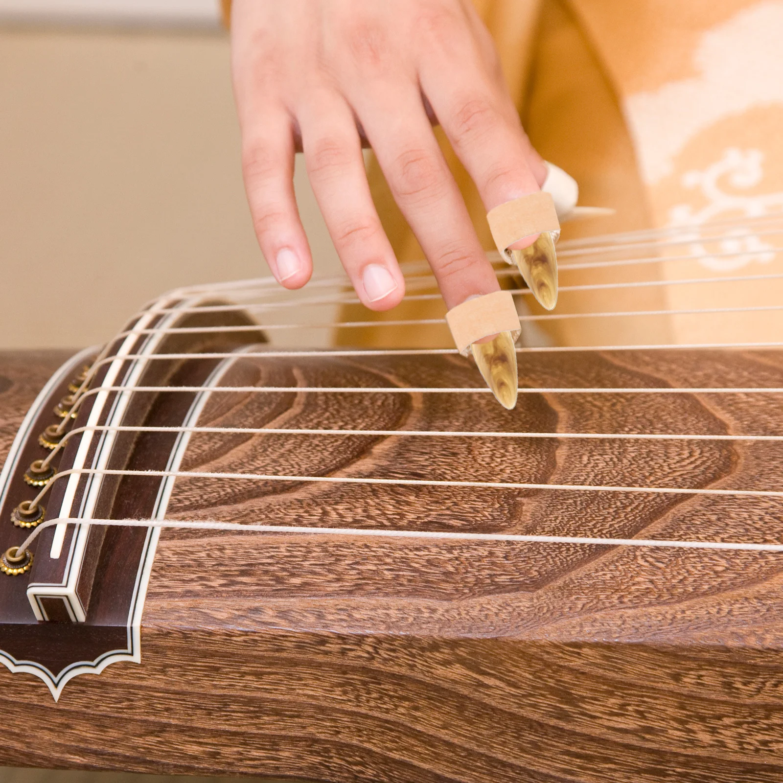 

1Set Guzheng Finger Picks Set Resin Material Natural Color with Storage Board Adhesive Finger Tape Comfortable Fit for Guzheng
