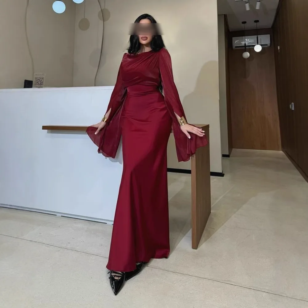 ชุดราตรีผ้าซาตินสีพื้นยาวทรงเข้ารูปสไตล์ตะวันออกกลาง ประดับด้วยผ้าคลุมสะโพก ดีไซน์ใหม่แฟชั่นฤดูใบไม้ร่วงและฤดูหนาวปี 2025 สไตล์ไฮสตรีท