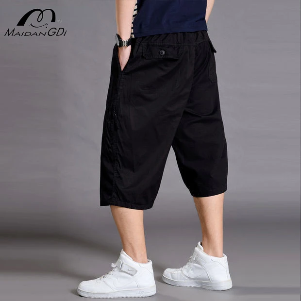 

MAIDANGDI Men's Loose Shorts Oversized Solid Color Multiple Pockets and Cropped Workwear Pants for Travel