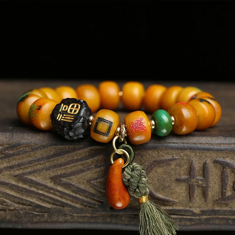 Tibetan-style reverse-carved bone mahjong tile bead bracelet, single-strand, made from ebony and turquoise