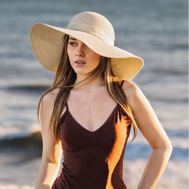 New summer women, sun-protective, fashionable with a flowing ribbon and bow, breathable straw hat for vacations