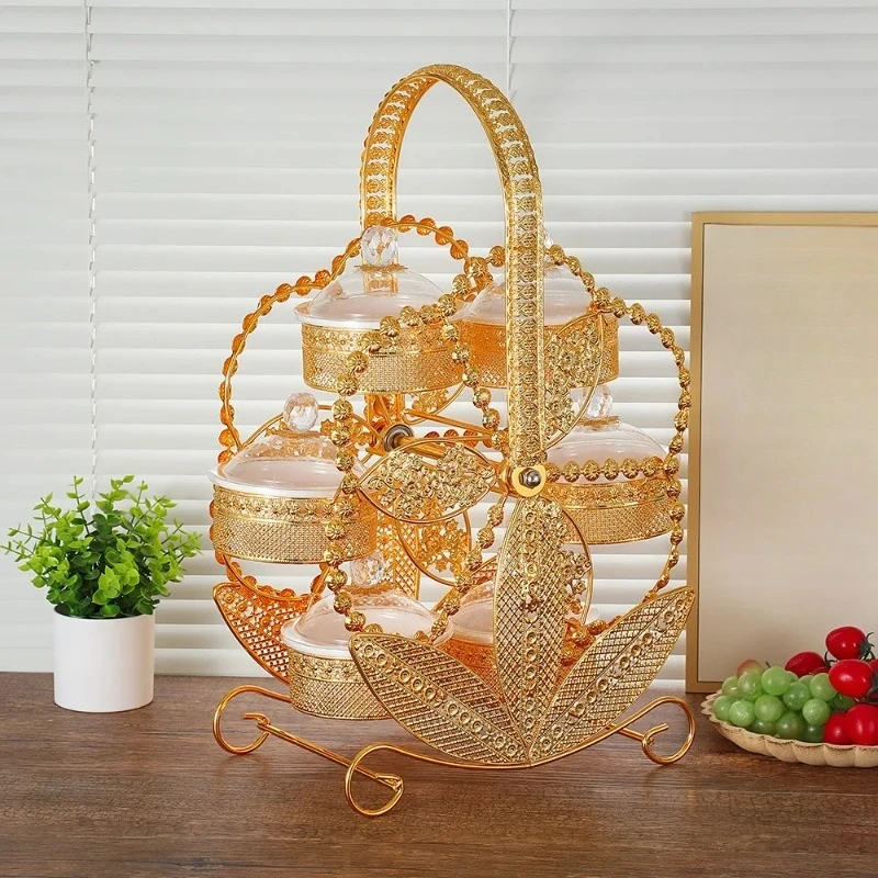 Squisito piatto di frutta acrilico in ferro battuto di fascia alta, mulino a vento creativo, vassoio rotante per snack, piatto di frutta per soggiorno, festa