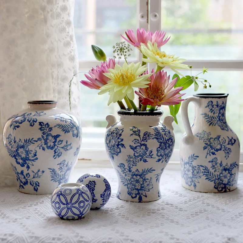 French-style vintage ceramic vase, blue and white porcelain with ice crackle pattern, mid-century high-end aesthetic, popular on