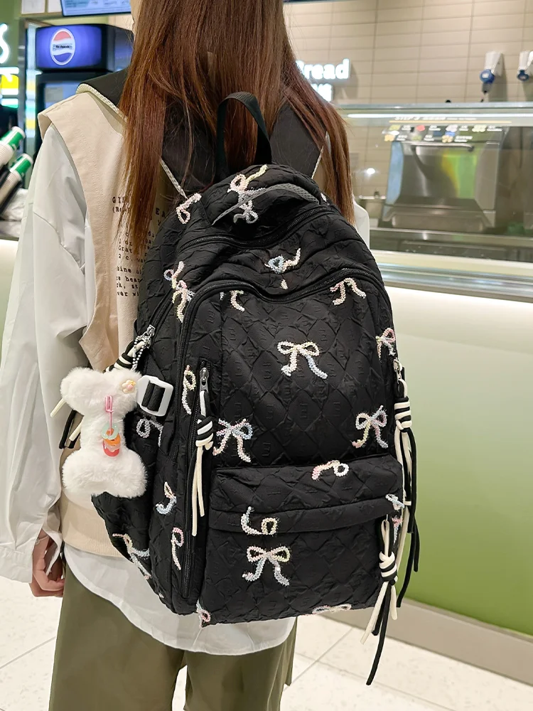 대용량 백팩 가벼운 여행 친화적인 학생용 숄더백 높은 미적 가치의 학교 가방 통근 스타일 나일론 소재