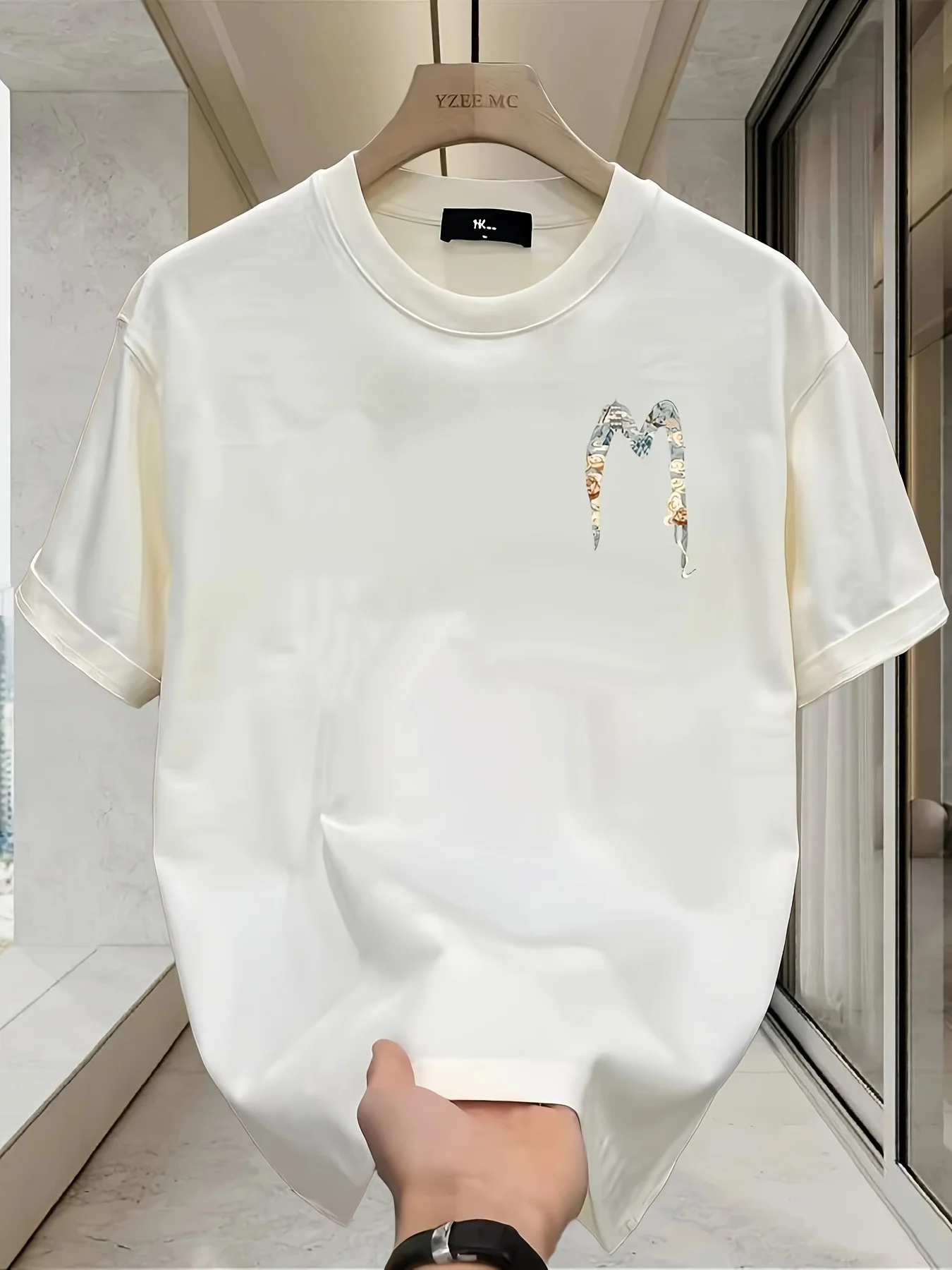 

The new men's T-shirt for the summer of 2025 features a casual fashionable comfortable and soft 3D letter pattern print