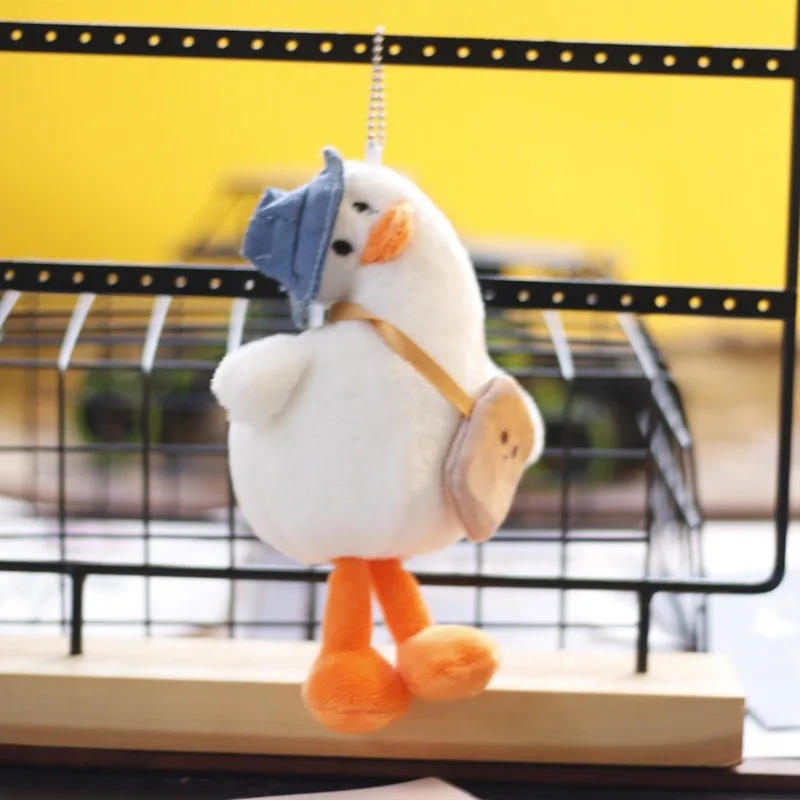 พวงกุญแจตุ๊กตาเป็ดน้อยน่ารัก ตุ๊กตาสัตว์นุ่มนิ่ม จี้ห้อยกระเป๋า ของตกแต่งรถ สำหรับเด็กชาย เด็กหญิง คู่รัก พวงกุญแจ จี้ห้อยสำหรับคนรัก