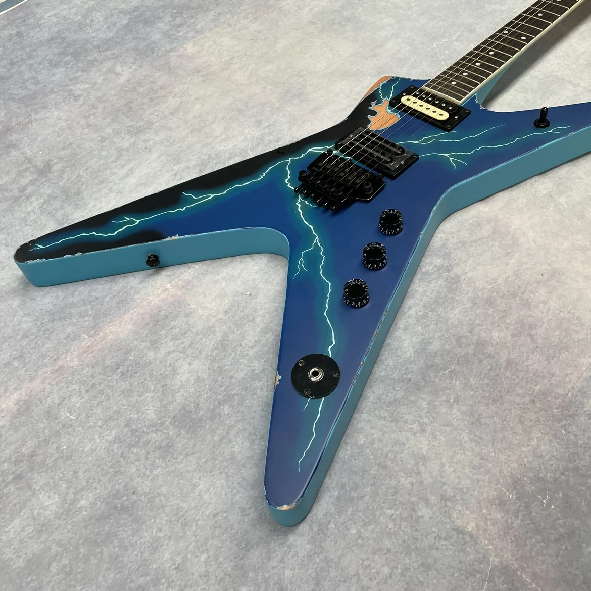 6-string electric guitar, black hardware, blue guitar
