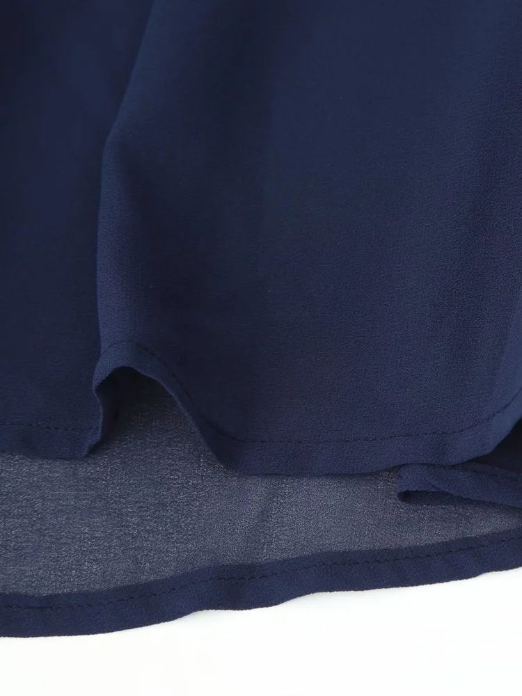 เดรสยาวผ้าชีฟองสำหรับผู้หญิง คอทรงโอ แขนกุด แต่งผ้าต่อลายตัดกัน ประดับพู่ห้อย ด้านหลังเปลือย ชายกระโปรงระบาย  ชุดเซ็กซี่สำหรับฤดูร้อน