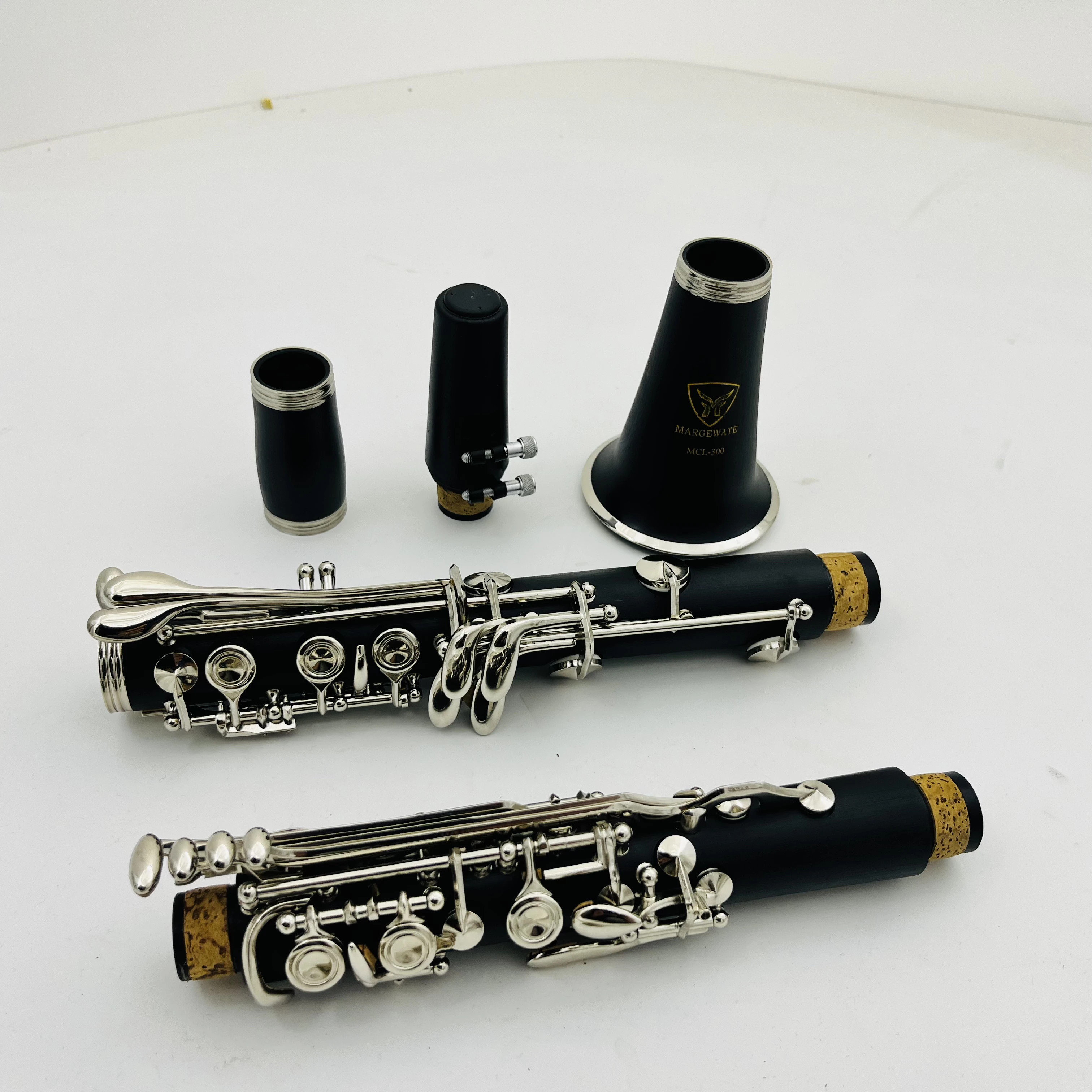 Fotos reales clarinete B plano cerrado tubo negro baquelita instrumento de viento de madera profesional con estuche