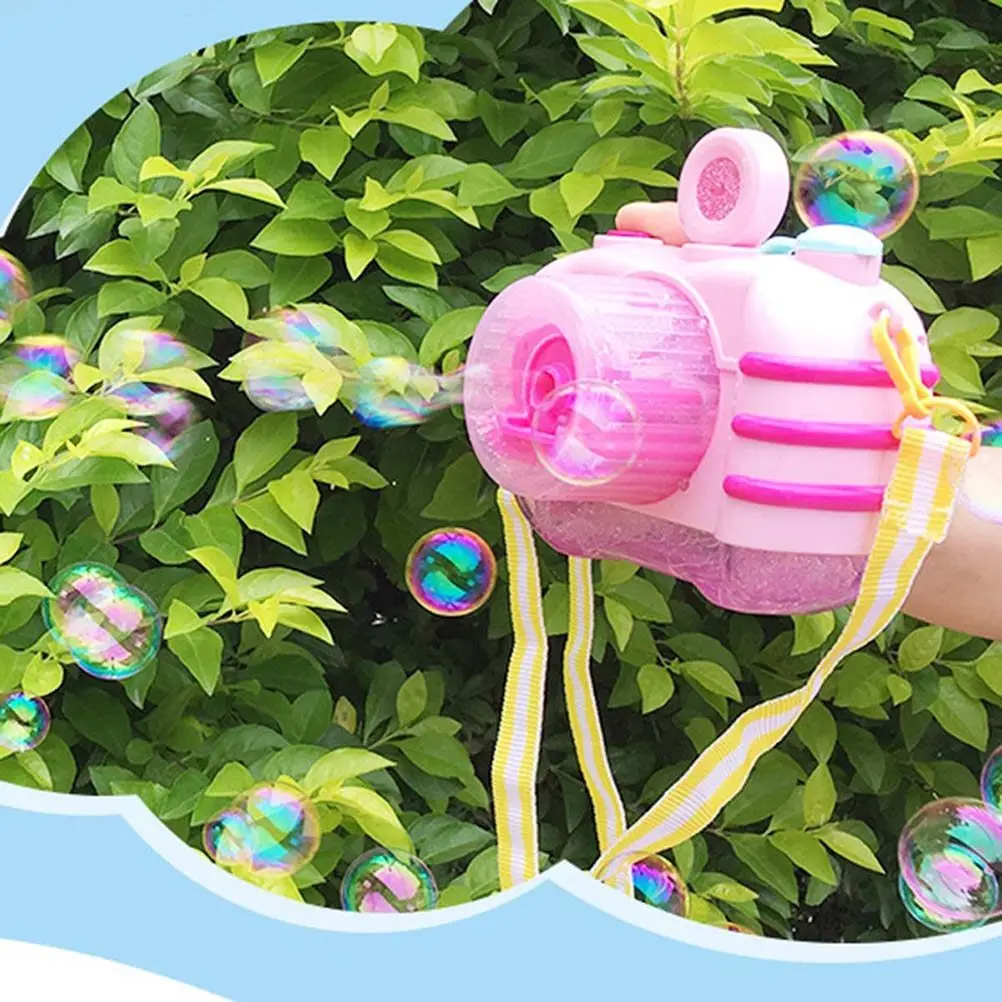 

Pink Automatic Bubble Maker Machine Camera Style with LED Light Music 2 Bubble Water Bottles Included for Children Outdoor Fun