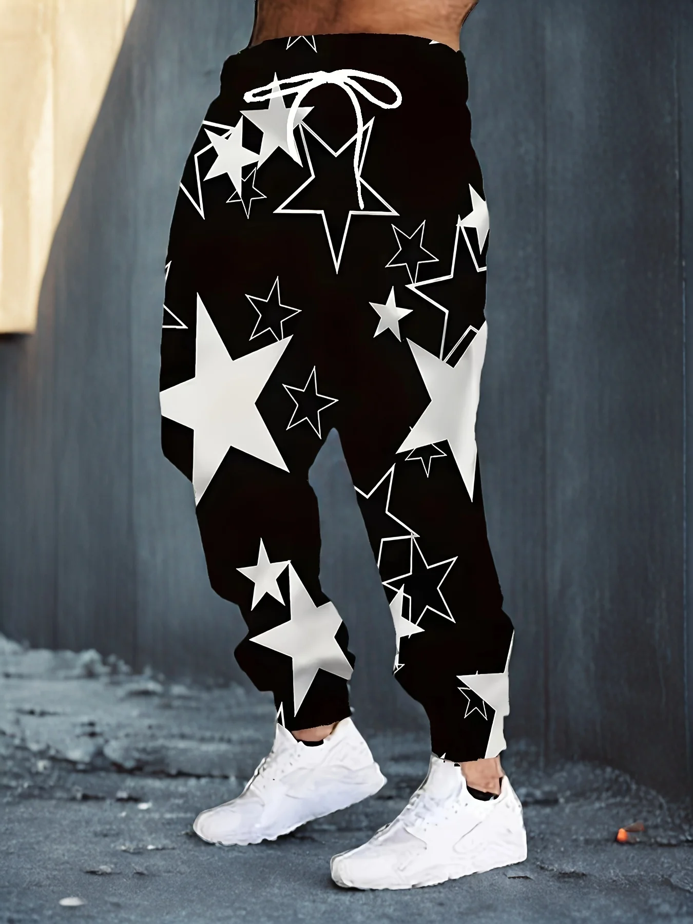 

Новые осенние мужские брюки 2025 года — это повседневные и модные уличные мужские брюки со звездами.