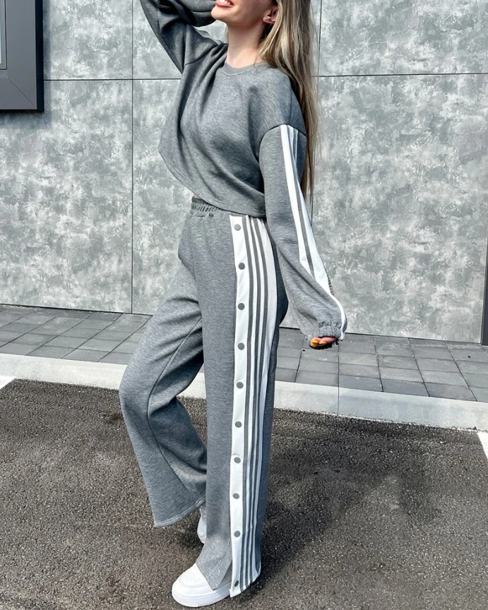 Two piece striped printed round neck long sleeved top with side button and slit, high waist and wide leg sports pants set, 2-pie