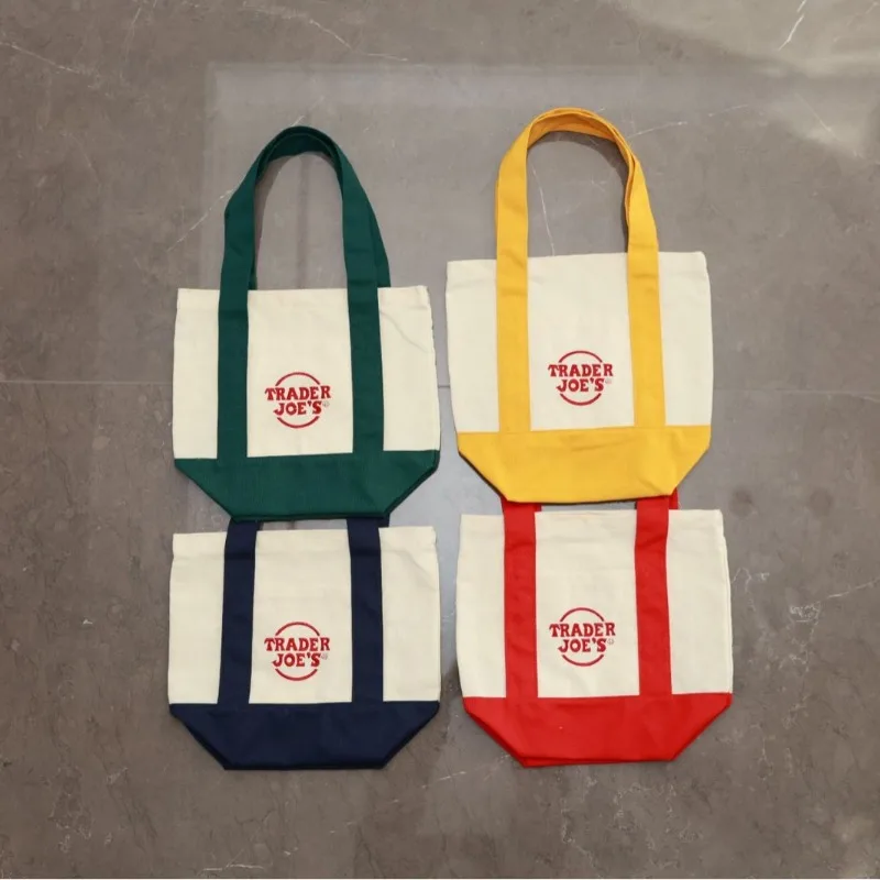 Sac en toile portable avec variété de couleurs et un seul logo, sac de shopping en coton portable, sac publicitaire en toile pour la formation.