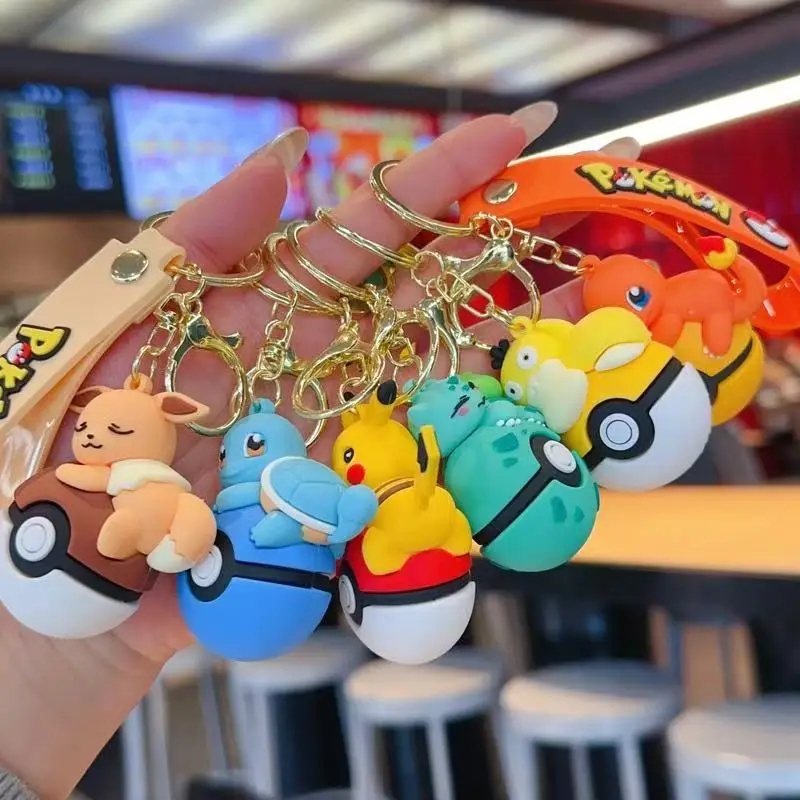 

Hot Anime Pokemon Keychain Set Pokeball Design with Pikachu Eevee Charmander Figures Cartoon Key Ring Bag Charm Gift