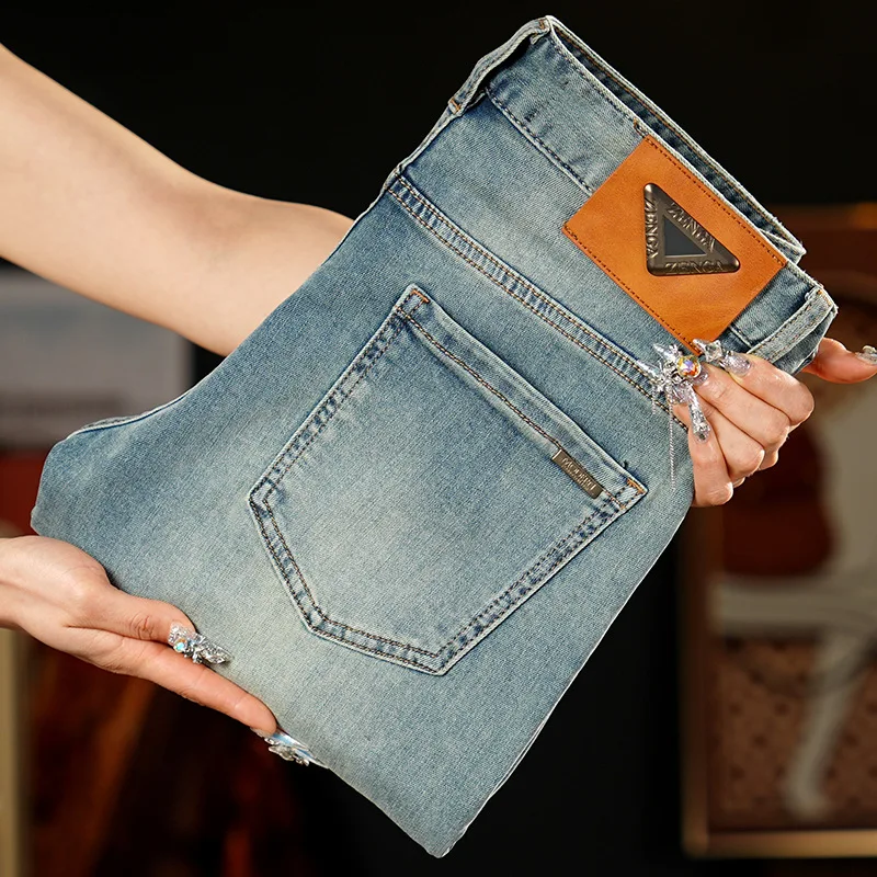 

Light luxury jeans men 2025 new spring slim fit small foot trend fashionable business men's clothing versatile pants