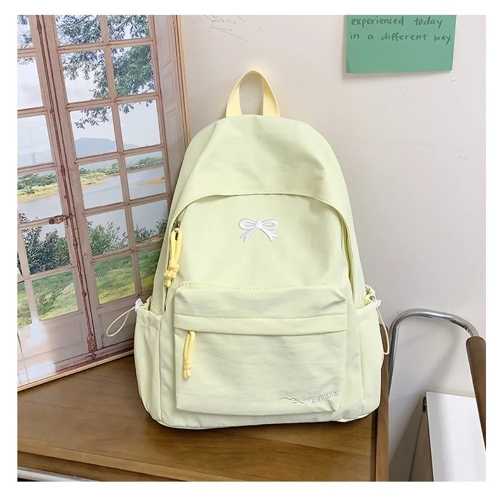 

Cute Embroidered Bow Girls Backpack Solid Color Large Capacity Students Schoolbag Nylon Lightweight Travel Rucksack