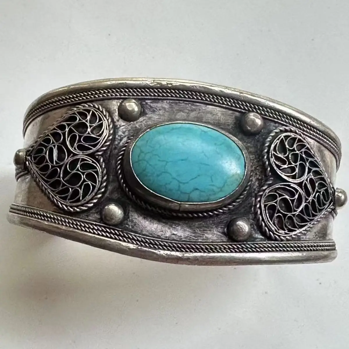 

Hot selling Exquisite silver inlaid turquoise bracelet with multiple treasures and adjustable opening