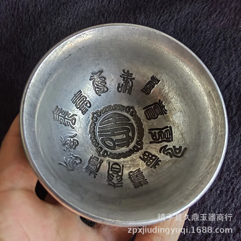 miscellaneous items: antique bowl with the character longevity, silver ornaments for home and office deco