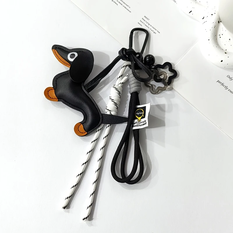 1 Stück Dackel-Schlüsselanhänger Taschenanhänger Mini-Stern PU-Leder Kreatives Geschenk für Frauen Geldbörse Auto-Anhänger Accessoires – Detail 7