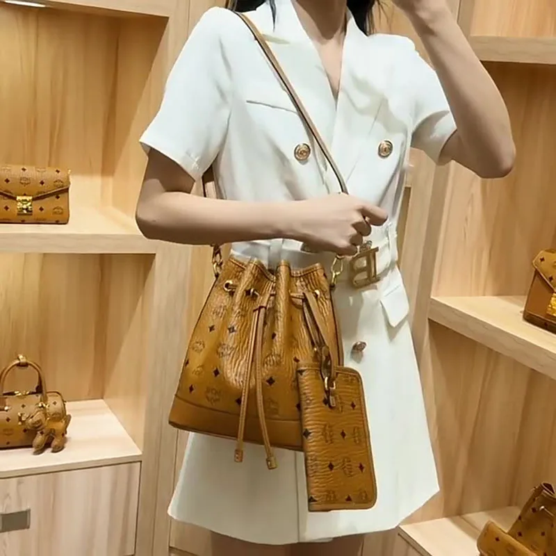 

2024 spring/summer new drawstring small bucket women's bag fashion senior sense hand bill shoulder crossbody E006