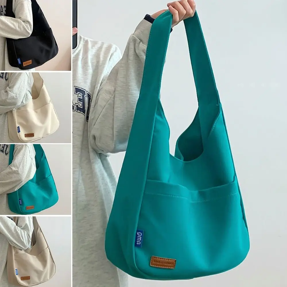 Borsa di tela Casual da donna estate 2024 nuova borsa a tracolla alla moda alla moda All-match borsa ascellare a tracolla di grande capacità