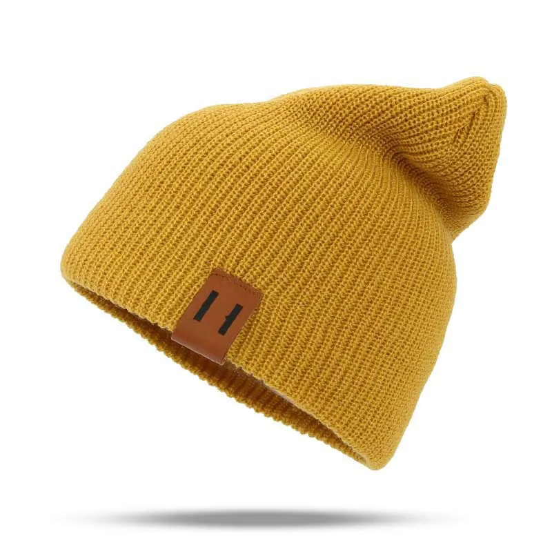 Children knitted wool pullover hat autumn and winter leather label solid color warm baby knitted cap with parent-child models