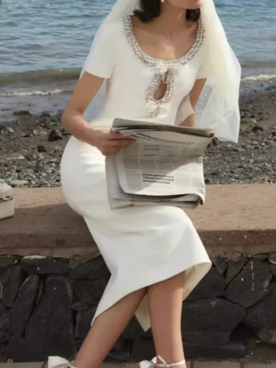 

2025 New Women White Midi Dress Bow Diamond Decoration Round Neck Short Sleeve Elegant Slim Robe