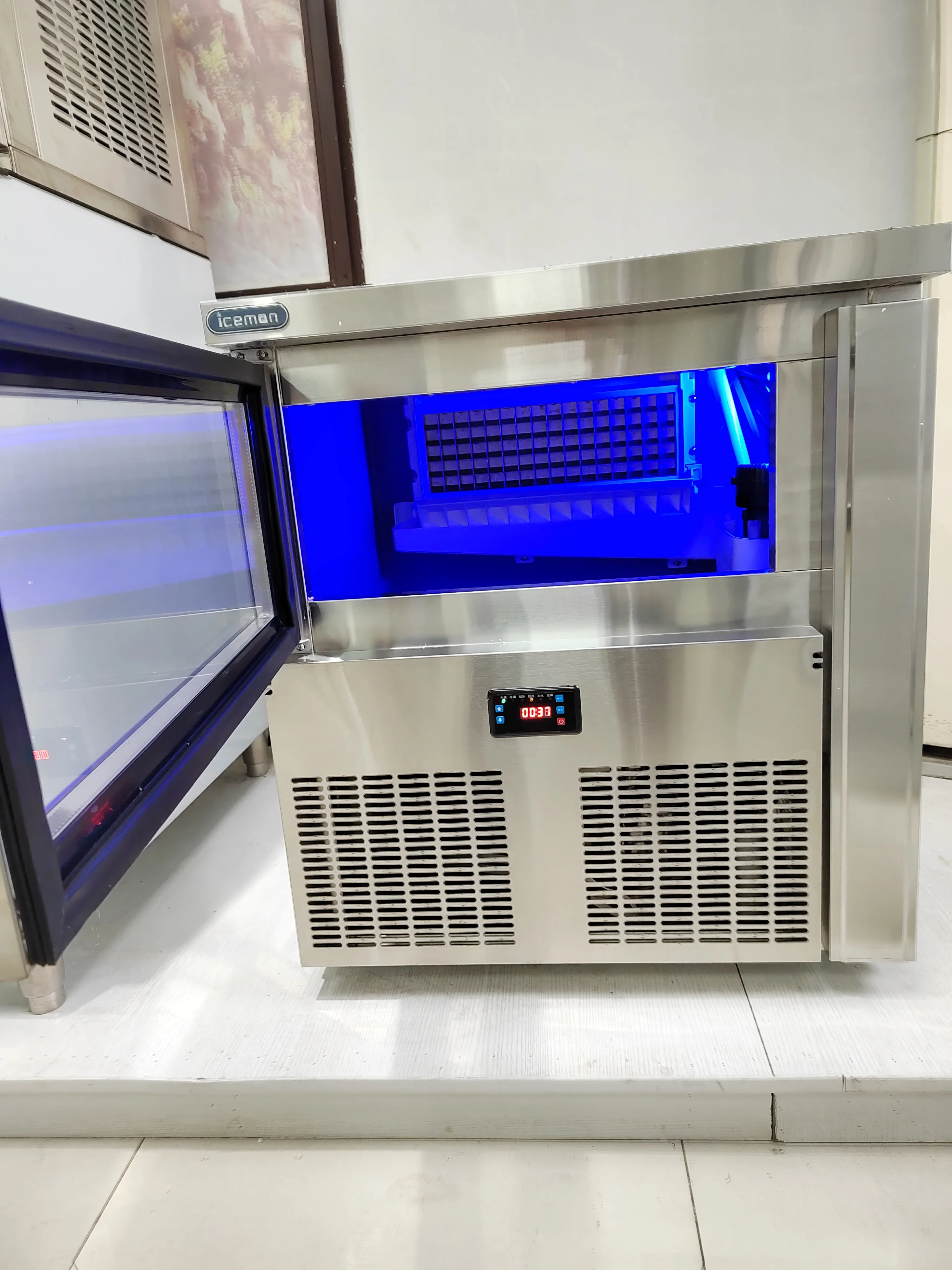 เครื่องทำน้ำแข็งอัตโนมัติ ICM-120P สำหรับธุรกิจ ขนาด 65 กก. คุณภาพสูง พร้อมไฟสีฟ้า ราคาโรงงานถูก เหมาะสำหรับโรงแรม/ร้านกาแฟ