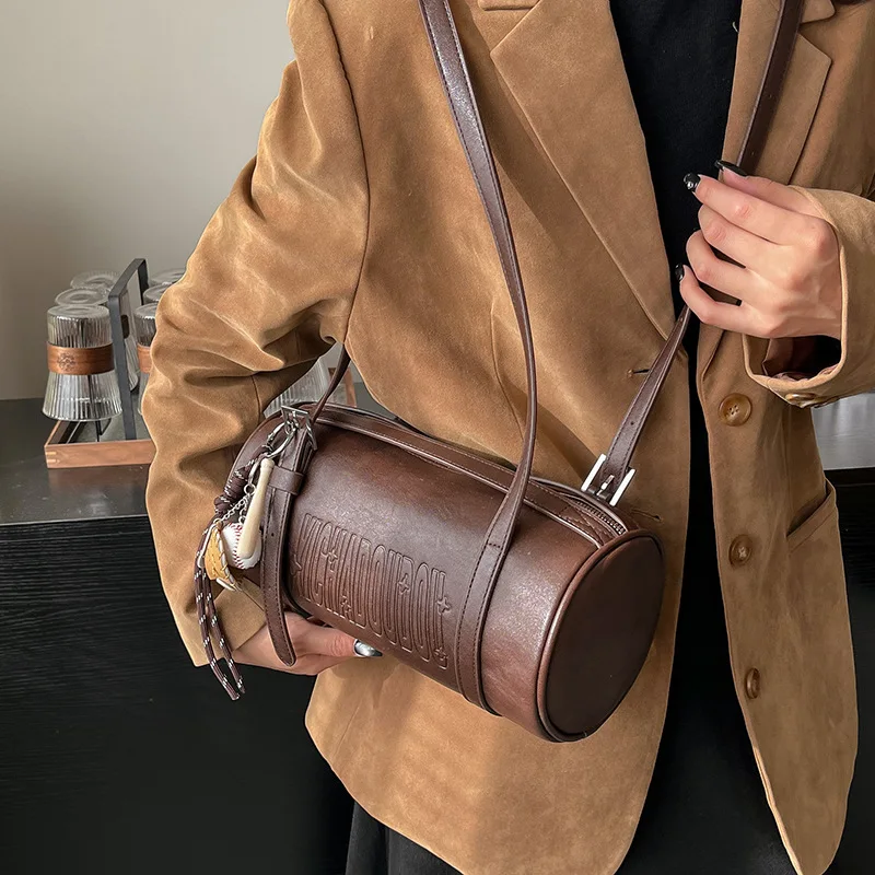 

Многофункциональная цилиндрическая женская сумка через плечо, зима 2024, новейшая дизайнерская сумка-тоут, роскошная сумка через плечо с подвеской