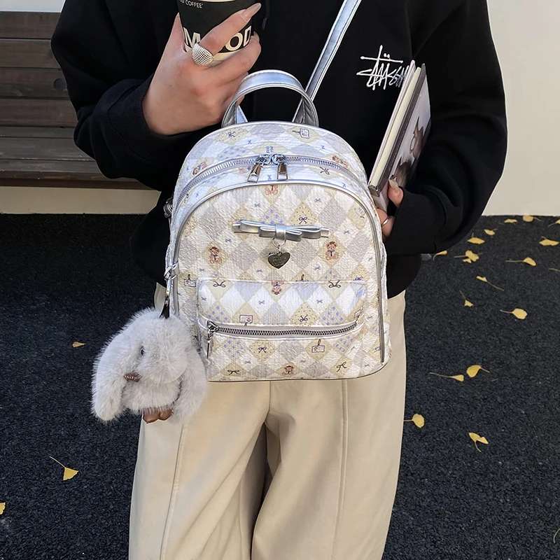 กระเป๋าเป้พิมพ์ลายหมีน่ารักสำหรับผู้หญิง 2025 ใหม่ กระเป๋าเดินทางลำลองความจุขนาดใหญ่ 6378XQ