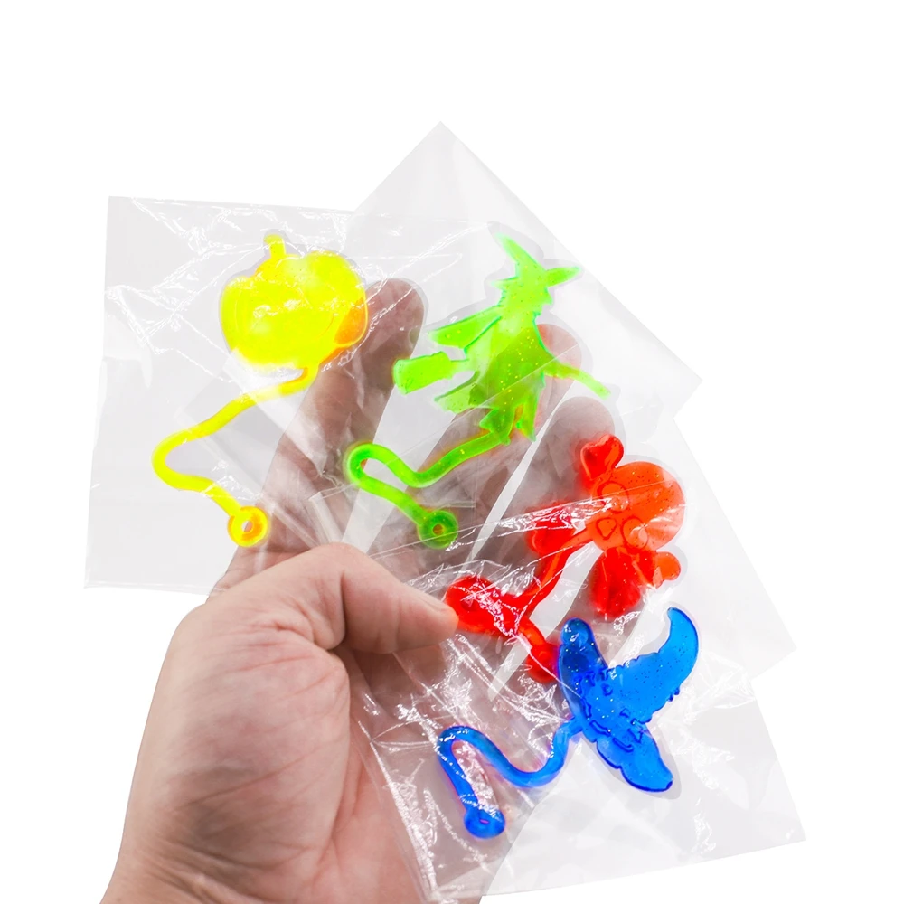 Zestaw Halloweenowy 12 Sztuk Dyni Duch Czaszka Lepkie Zabawki Elastyczne Rozciągliwe Naklejki na Ścianę Idealne na Upominki na Przyjęcia Urodzinowe