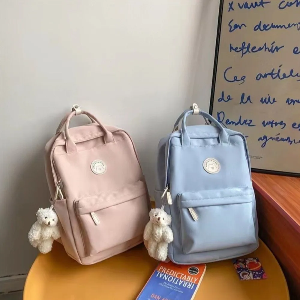 Solid Large Capacity Student Backpack Zipper Nylon Academy Girl's School Bag Spacious Multi-Pocket Plush Pendant Teens Rucksack