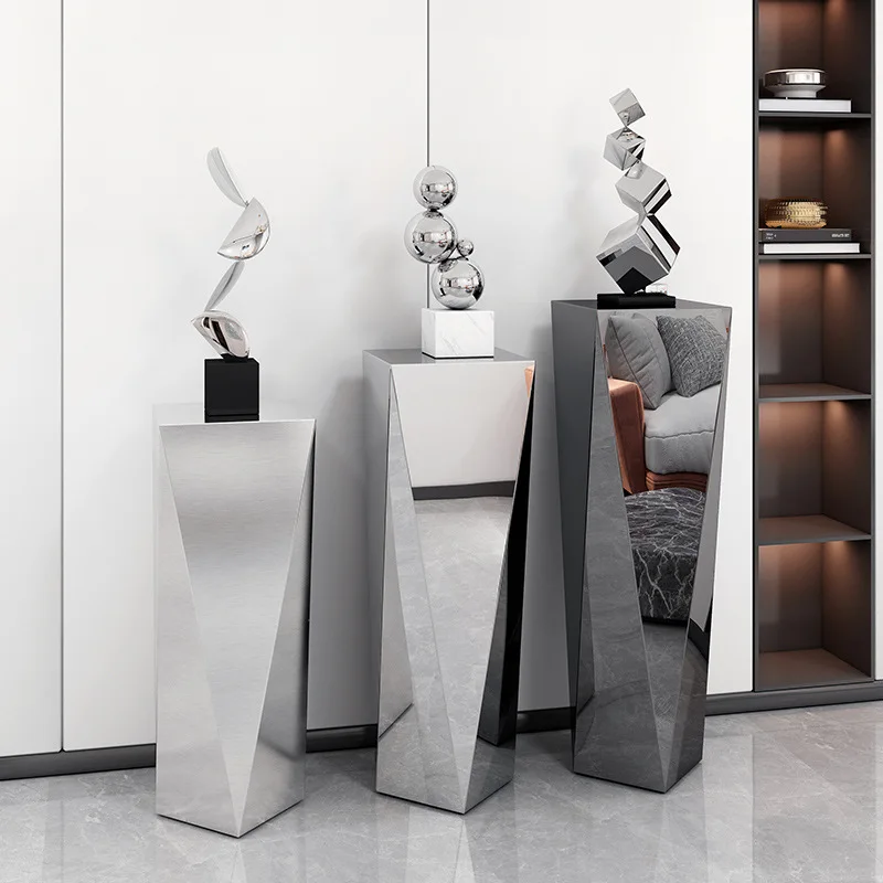 CX stainless steel sculpture table next to TV cabinet flower stand Italian light luxury living room floor ornament