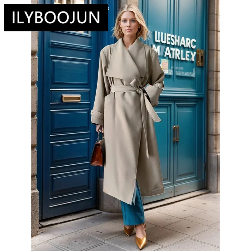 

ILYBOOJUN Solid Spliced Belt Loose Trench For Women Lapel Long Sleeve Patchwork Pockets Irregular Trenchs Female Clothes New