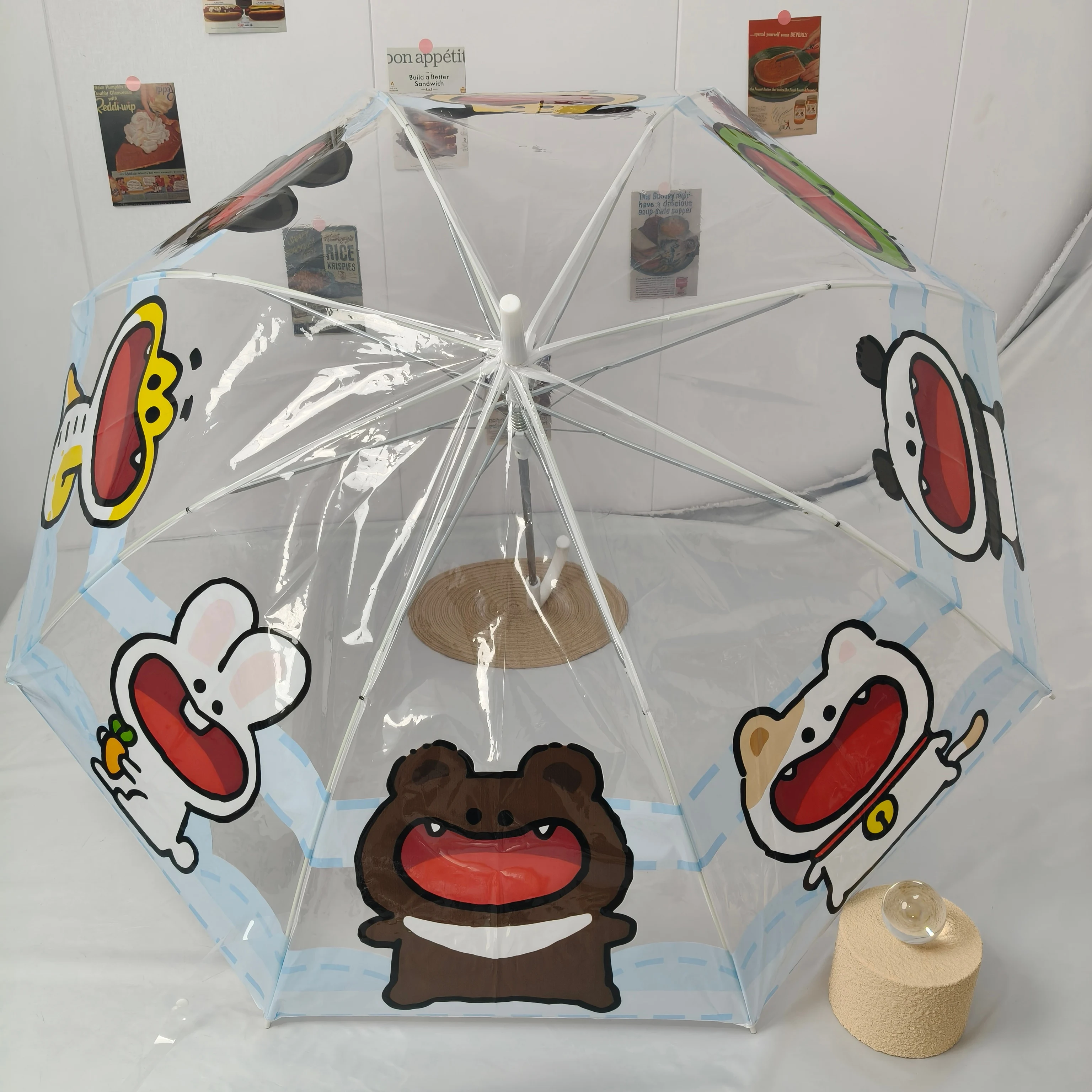 Ein Vollautomatischer PVC-Transparenter Regenschirm mit Großem Tiermuster, Wasserdicht und Windfest, Geeignet für Reisen