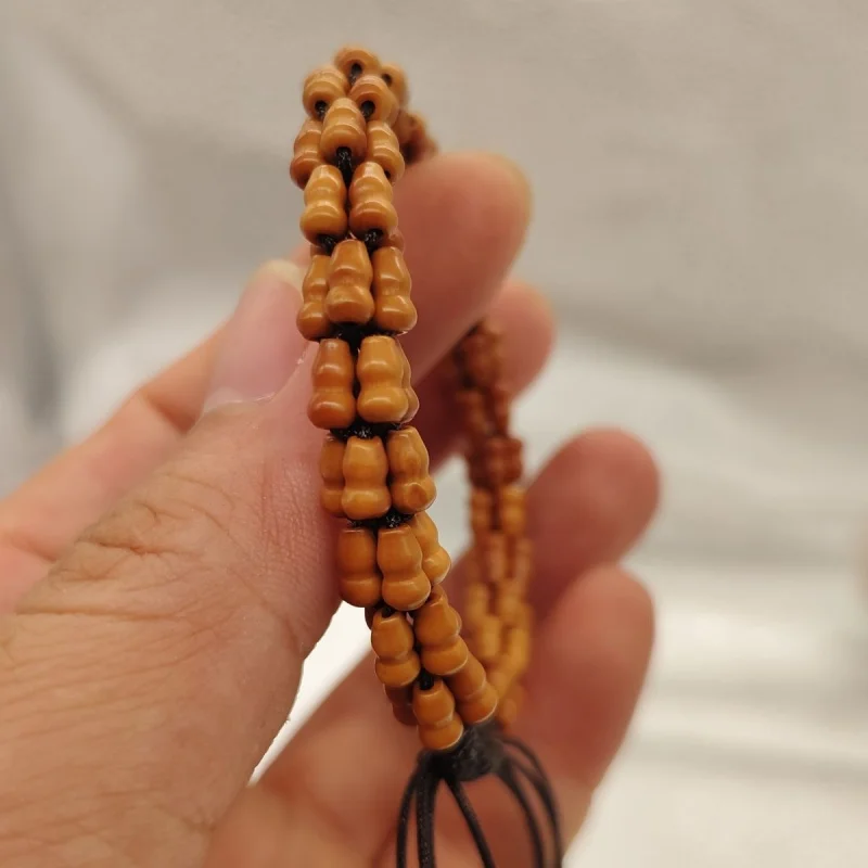 

Olive pit , the symbolizes both fortune prosperity, brings peace and auspiciousness! Gourd bracelet