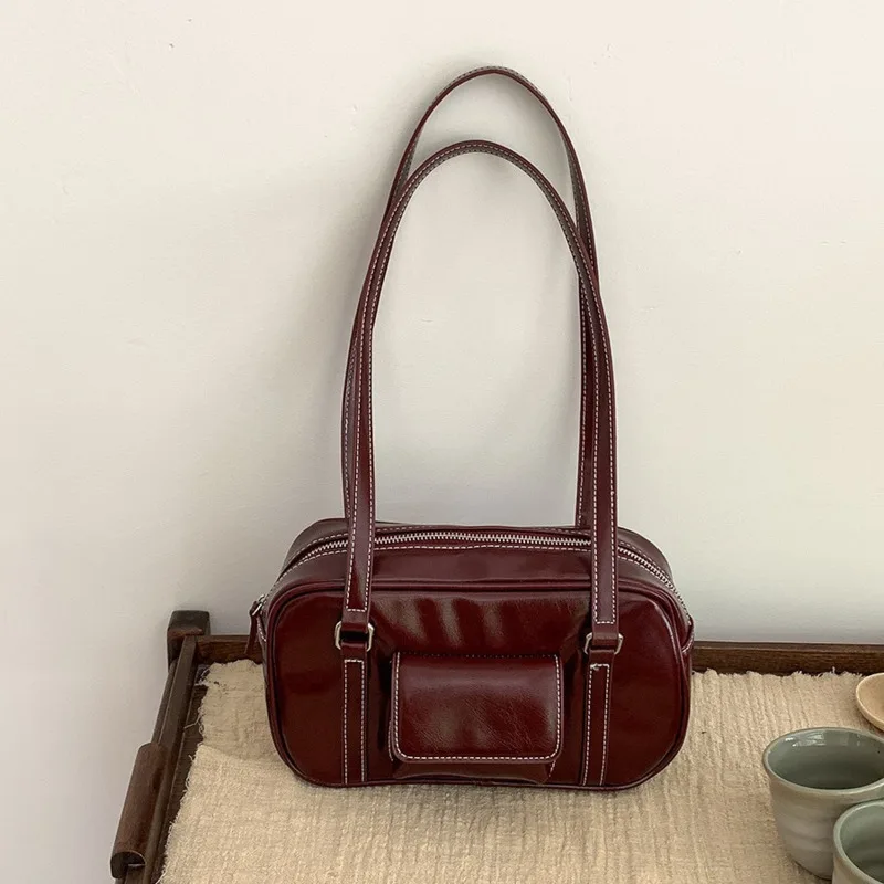 New shoulder bag with large capacity, high-end feel, commuting niche style, underarm bag, Korean version handbag, women's 2024