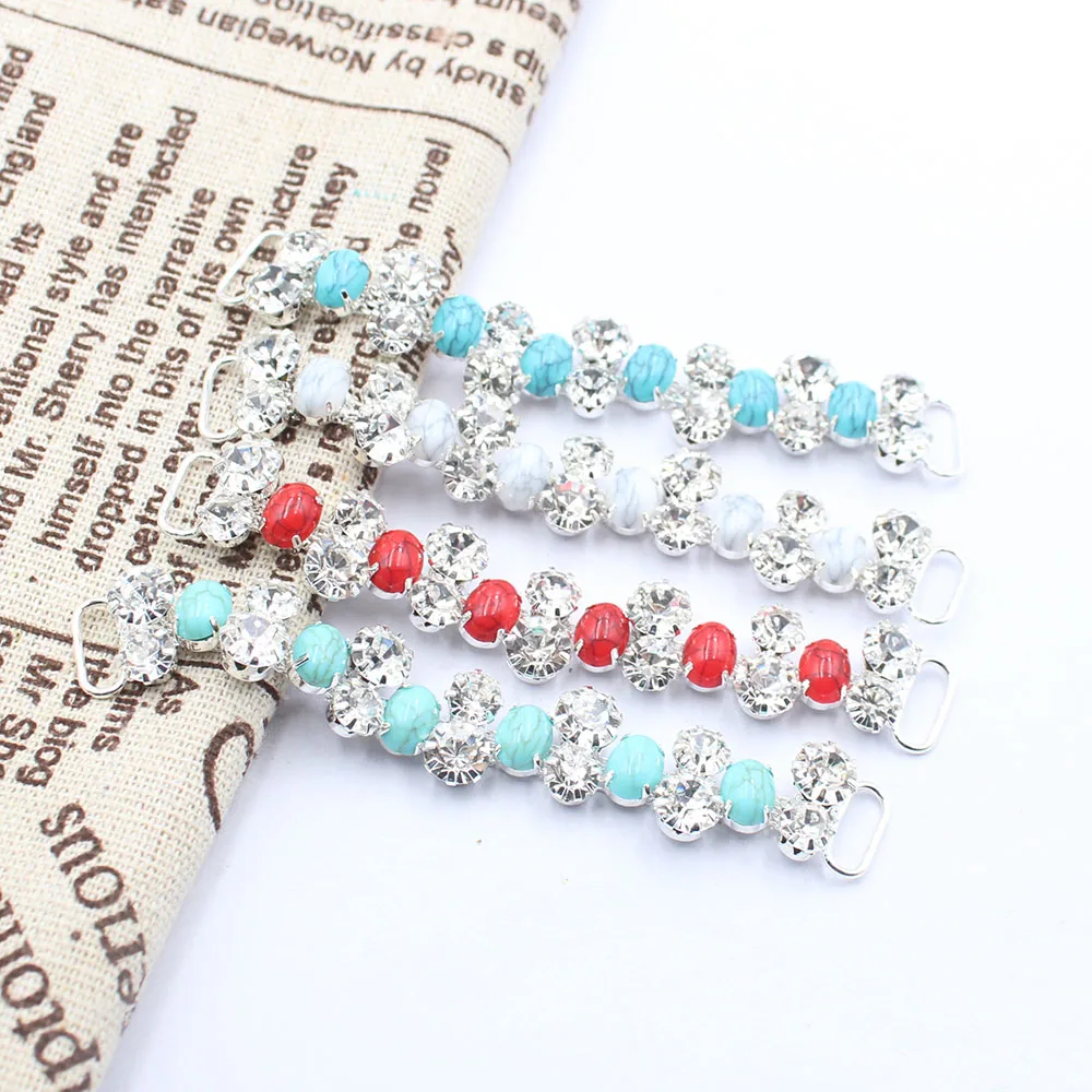 Factory direct sales of 12 * 90mm cracked turquoise crystal bikini buckle reinforced flat chain DIY clothing swimsuit chain deco