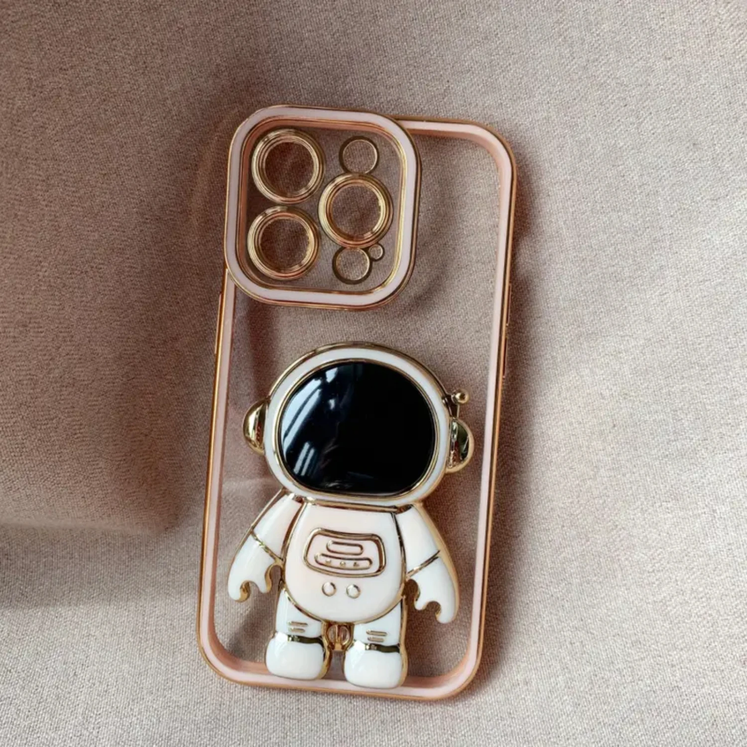 

ne Safe and Stylish with this Shiny and Reliable Astronaut Holder Phone Case Compatible with Various iPhone Models
