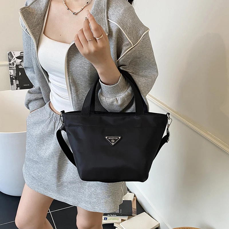 

Стильная сумка-саквояж в парижском стиле, элегантная кожаная сумка через плечо для женщин, модная вместительная сумка-клатч.