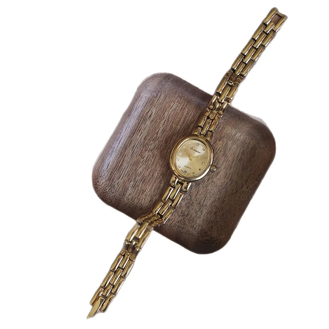 

Часы Золотые Маленькие Золотые Часы Стальной Ремень Минималистичные Гусиные Яйца Высококачественные Нежные Ретро Женские Часы