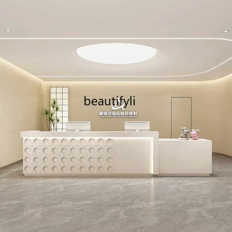 Wabi sabi cream wind checkout page photography gallery clothing store bar beauty salon front desk company paint reception desk