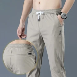 Heren Nieuwe Casual Broek Mode Stretch Straight Slanke Broek Hong Kong Windenijs Zijde Losse Alles Trend Buitenlandse Joggingbroek